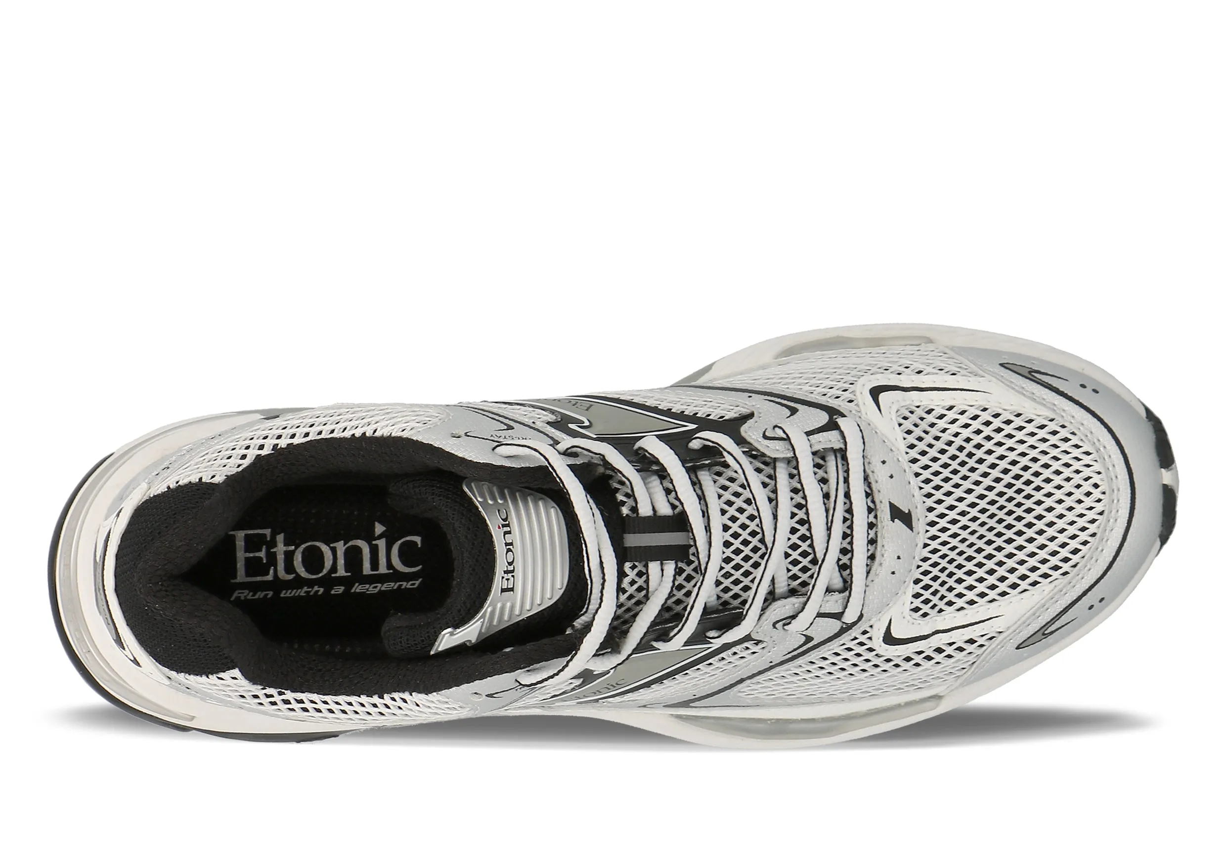 Etonic Evolution sneakers in black and white mesh fabric and white and silver vegan leather with black inserts and black lining.